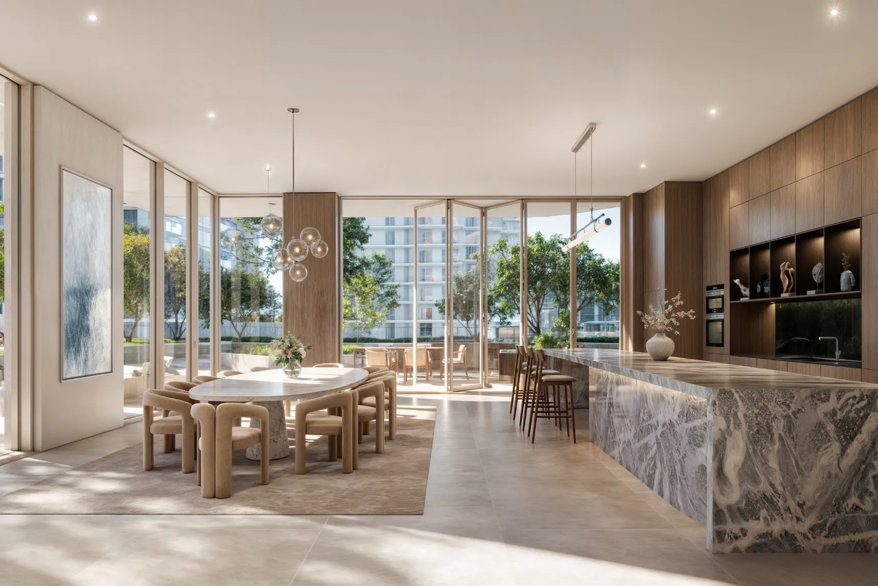 Private dining room with marble island and folding doors to the garden